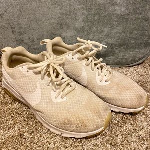 White Nike tennis shoes